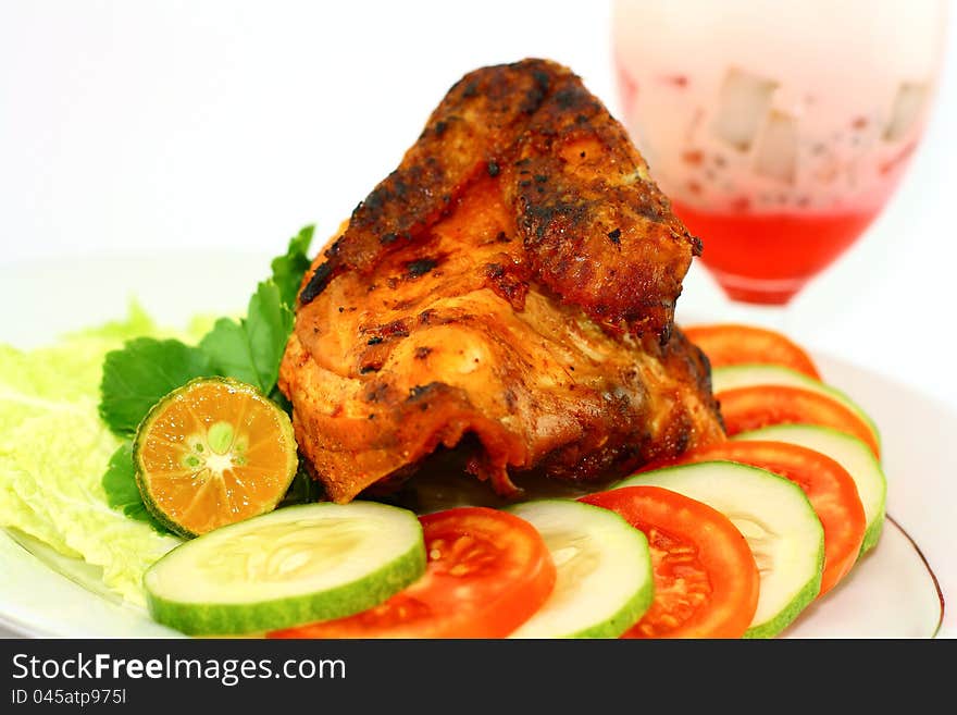 Roasted chicken with vegetables on white background. Roasted chicken with vegetables on white background