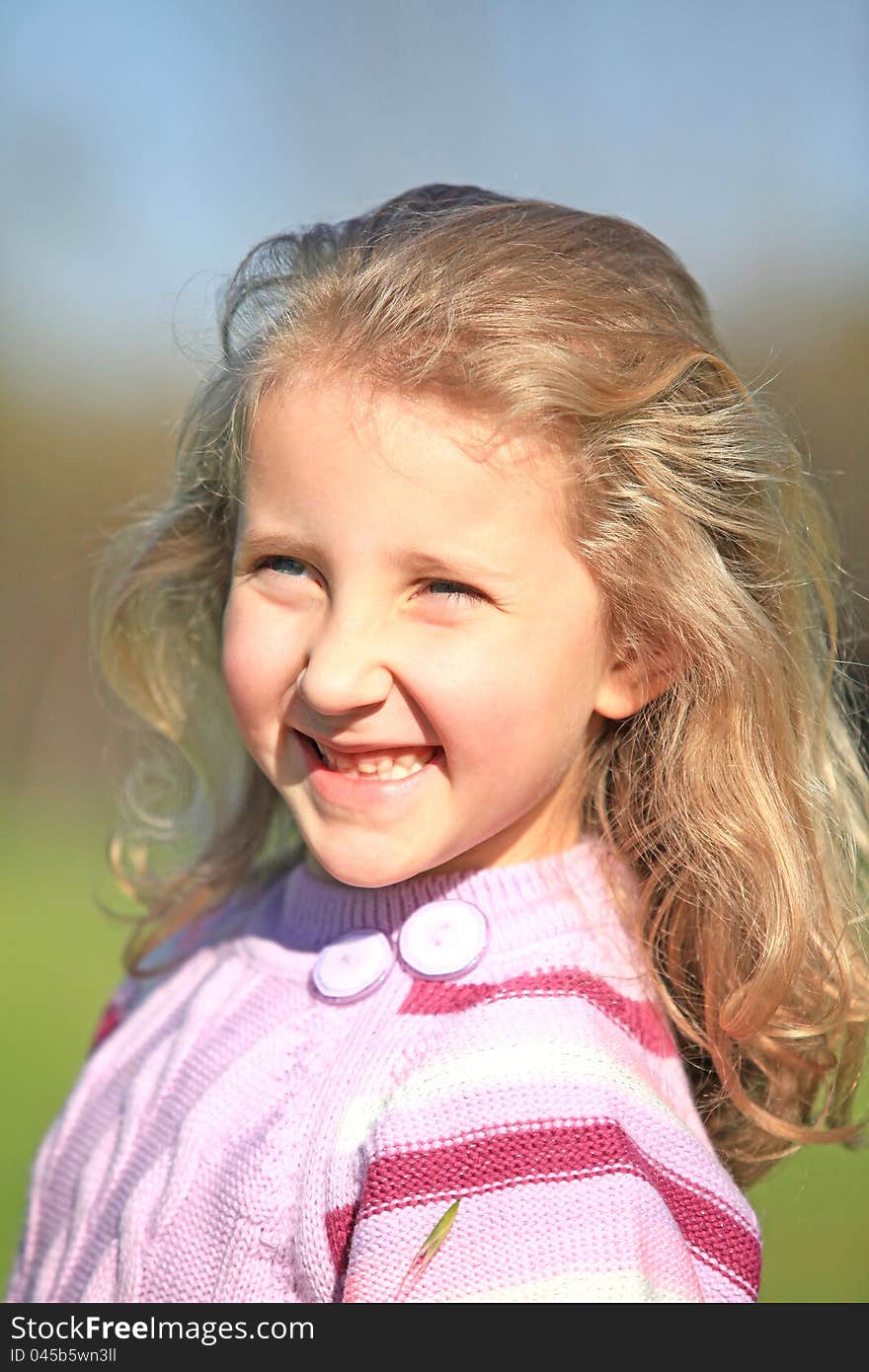 Portrait Of A Smiling Girl