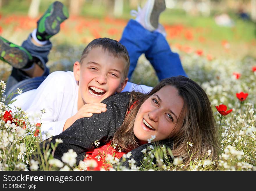 Mother and son fool around in the park