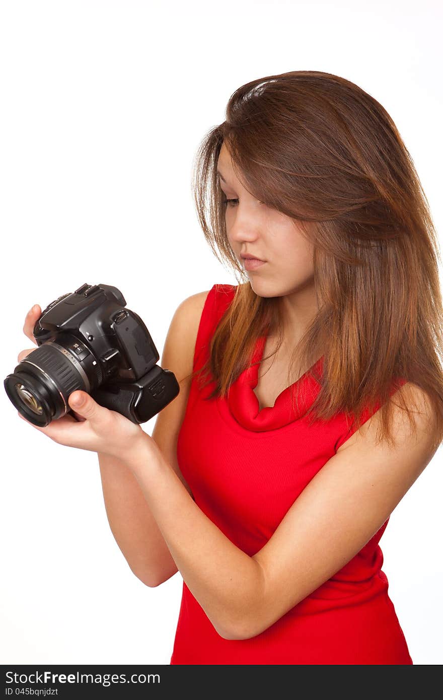 The yoing girl with the digital camera. The yoing girl with the digital camera