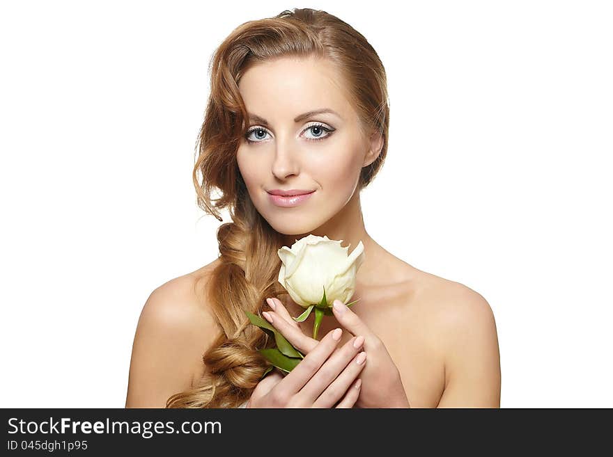 Smiling beautiful woman with white rose