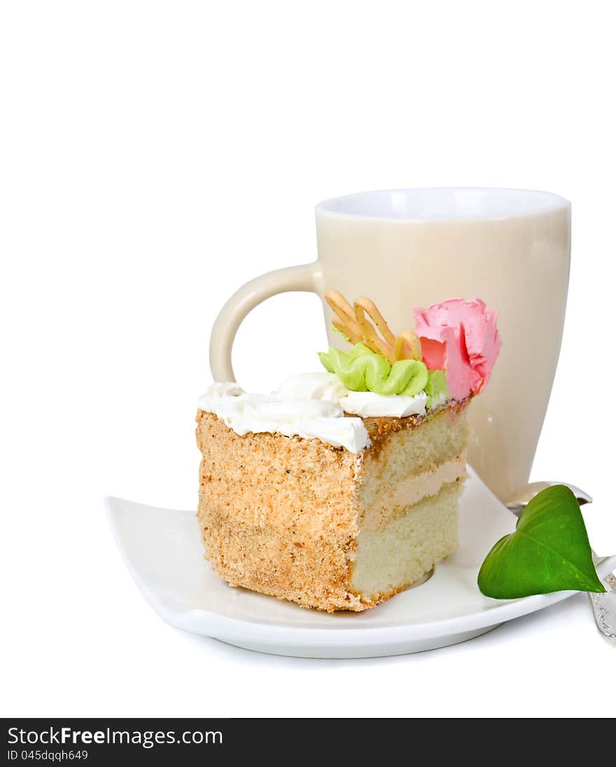 Cake on a saucer with a green sheet