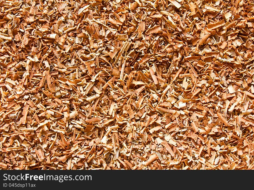 Brown sawdust from hardwood. Brown sawdust from hardwood.