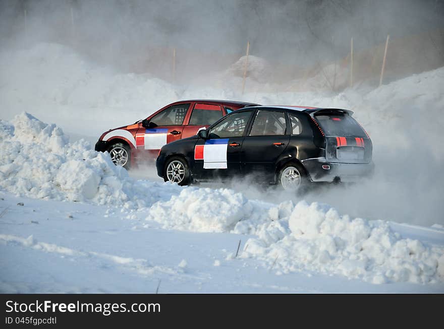 Two cars together on an input in turn track, automobile ice on race. Two cars together on an input in turn track, automobile ice on race