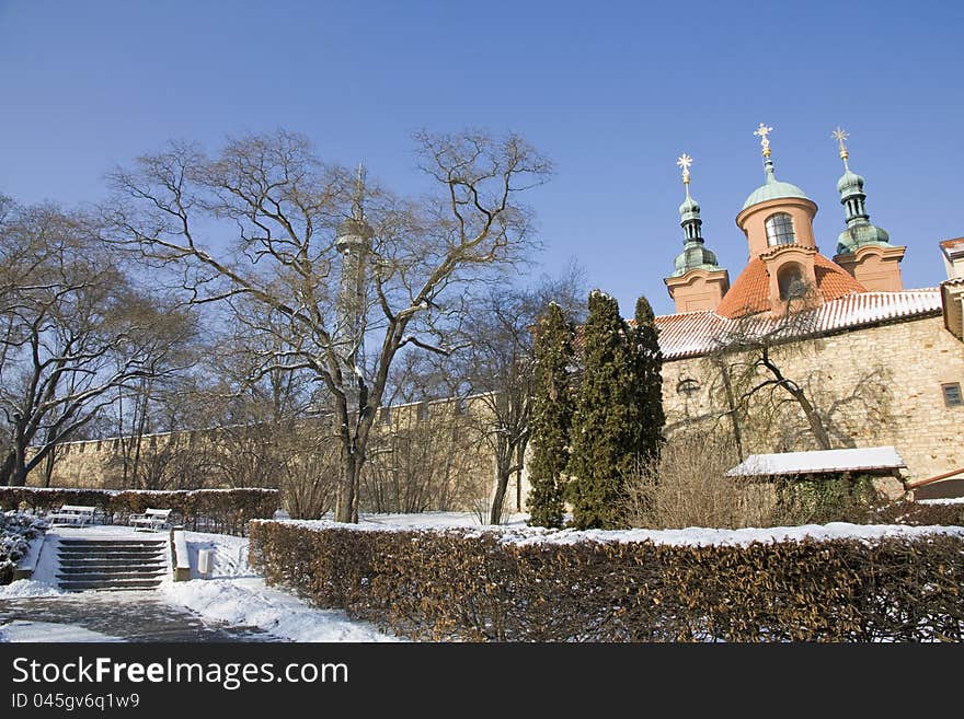 Church in winter, the church in Prague, Petrina at church, the church is snow on the roof, the church with three towers