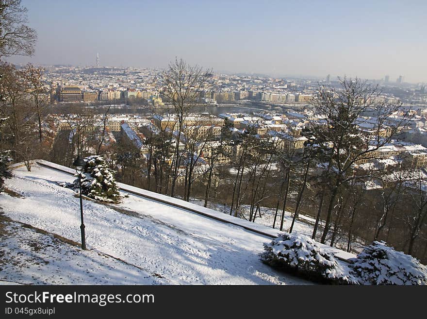 Winter panorama from the viewing threshold, Prague under snow, a view of the river, view from above the threshold, snowy sunny day in Prague. Winter panorama from the viewing threshold, Prague under snow, a view of the river, view from above the threshold, snowy sunny day in Prague