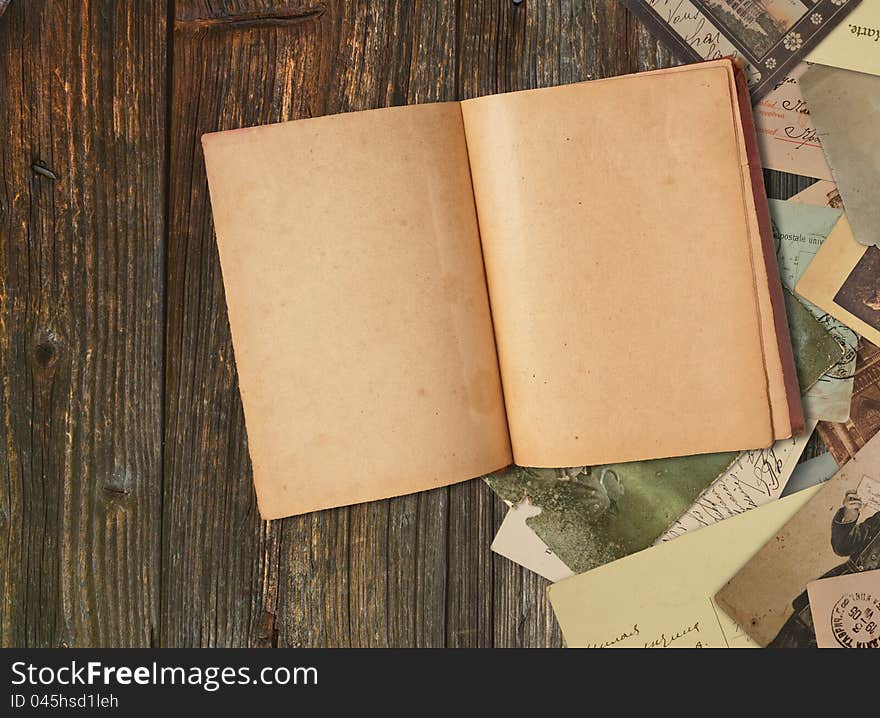 Vintage book on wooden background. Vintage book on wooden background