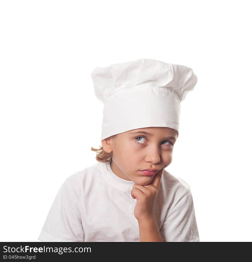 Thoughtful little cook on a white background