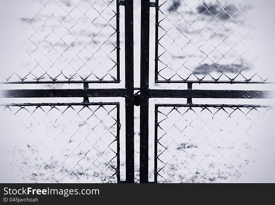 Cross  in black and white made of  metal with vintage effect. Cross  in black and white made of  metal with vintage effect