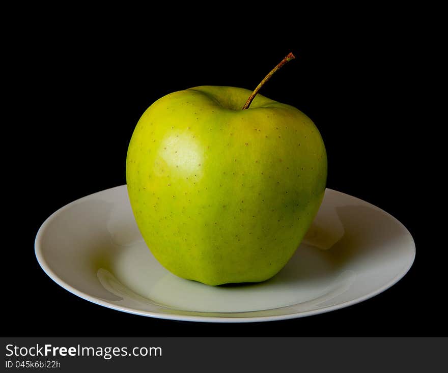 Green Apple On A Plate