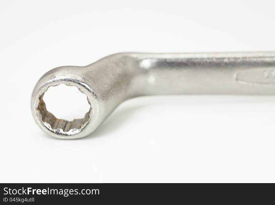 Metal tool or wrench with white background