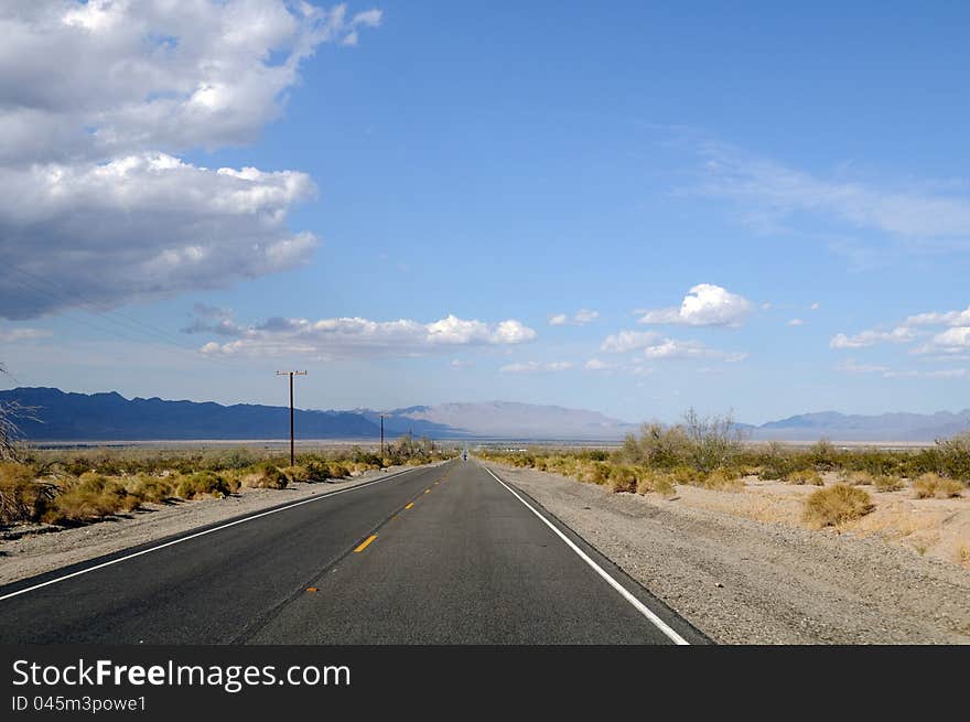 Straight road in Death Valley. Nevada, US. Straight road in Death Valley. Nevada, US