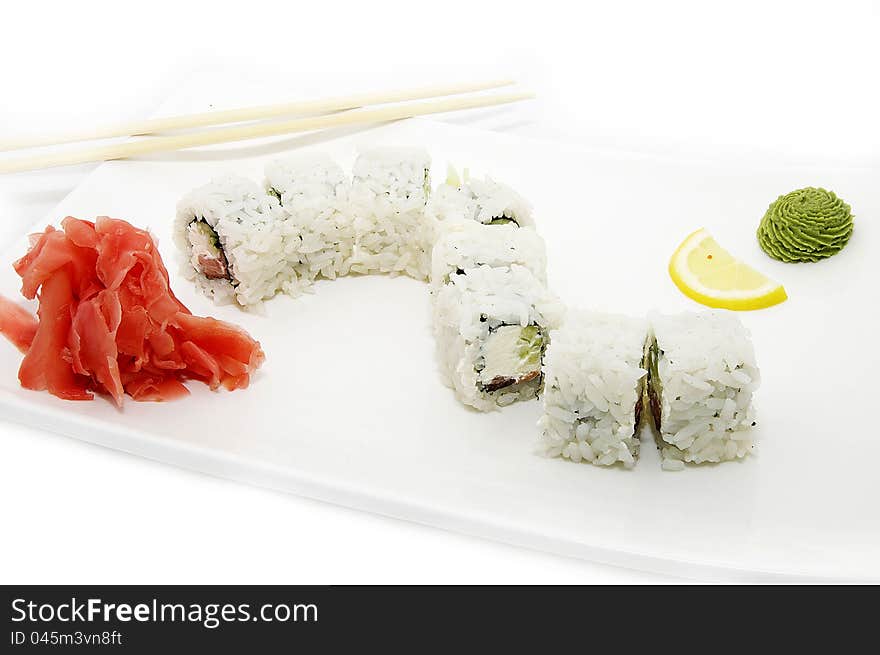 Sushi rice decorated with red fish and lemon