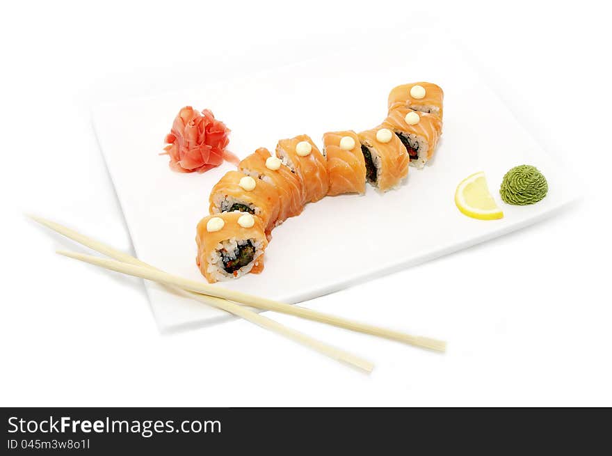 Japanese sushi of salmon on a white plate