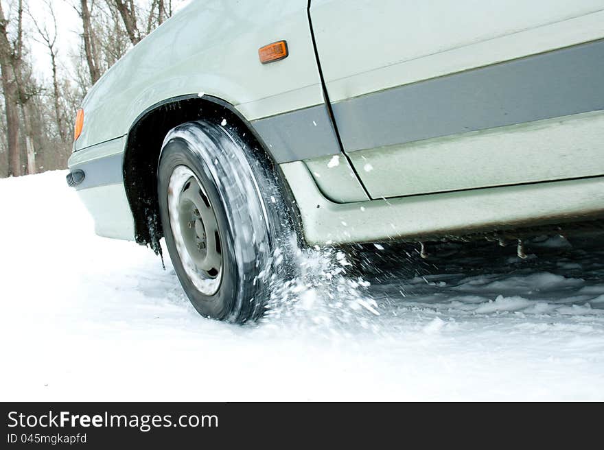 Car rides on snowy roads