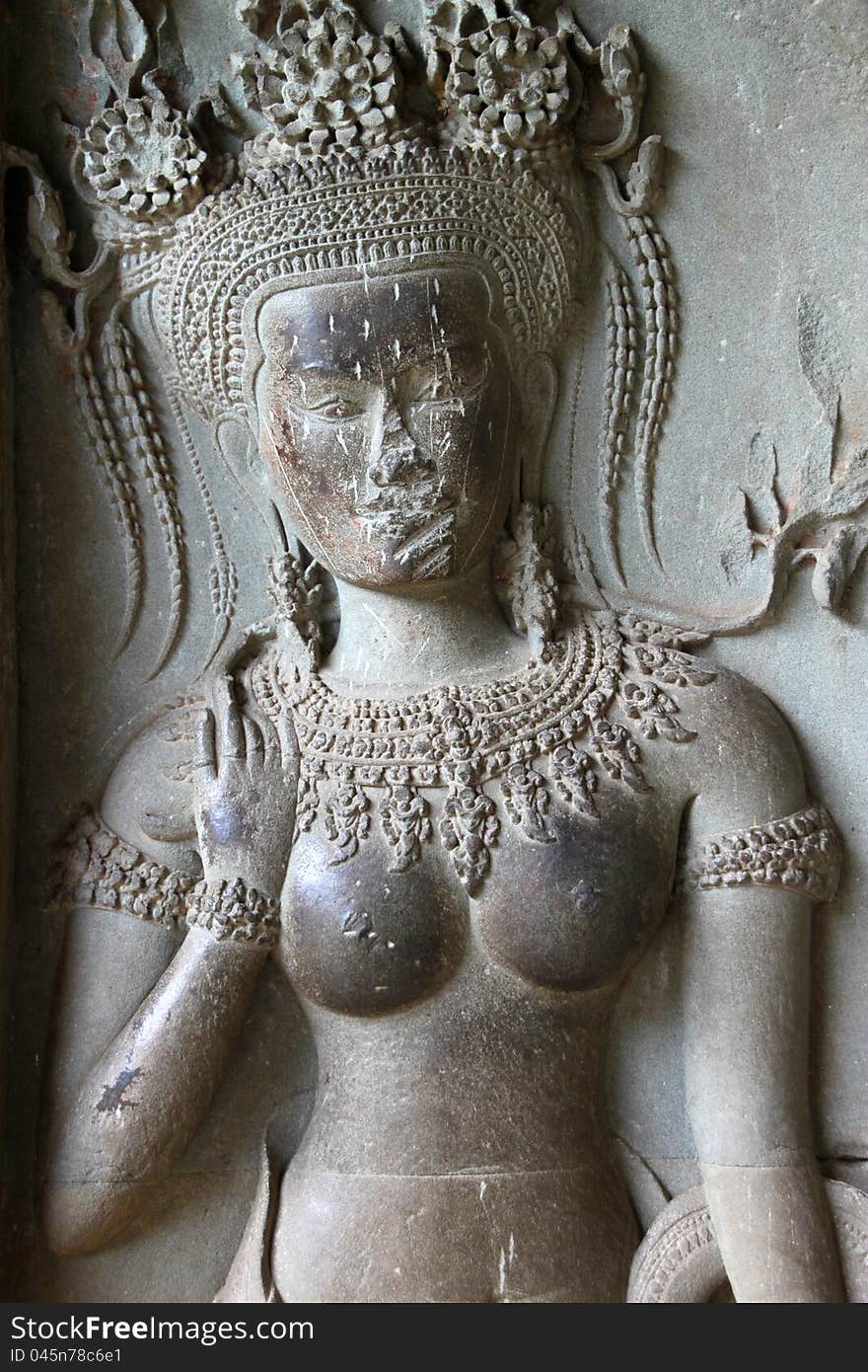 Apsara carving on wall of Angkor Wat