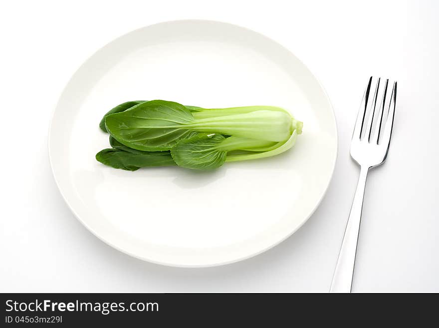 Chinese cabbage on a white plate