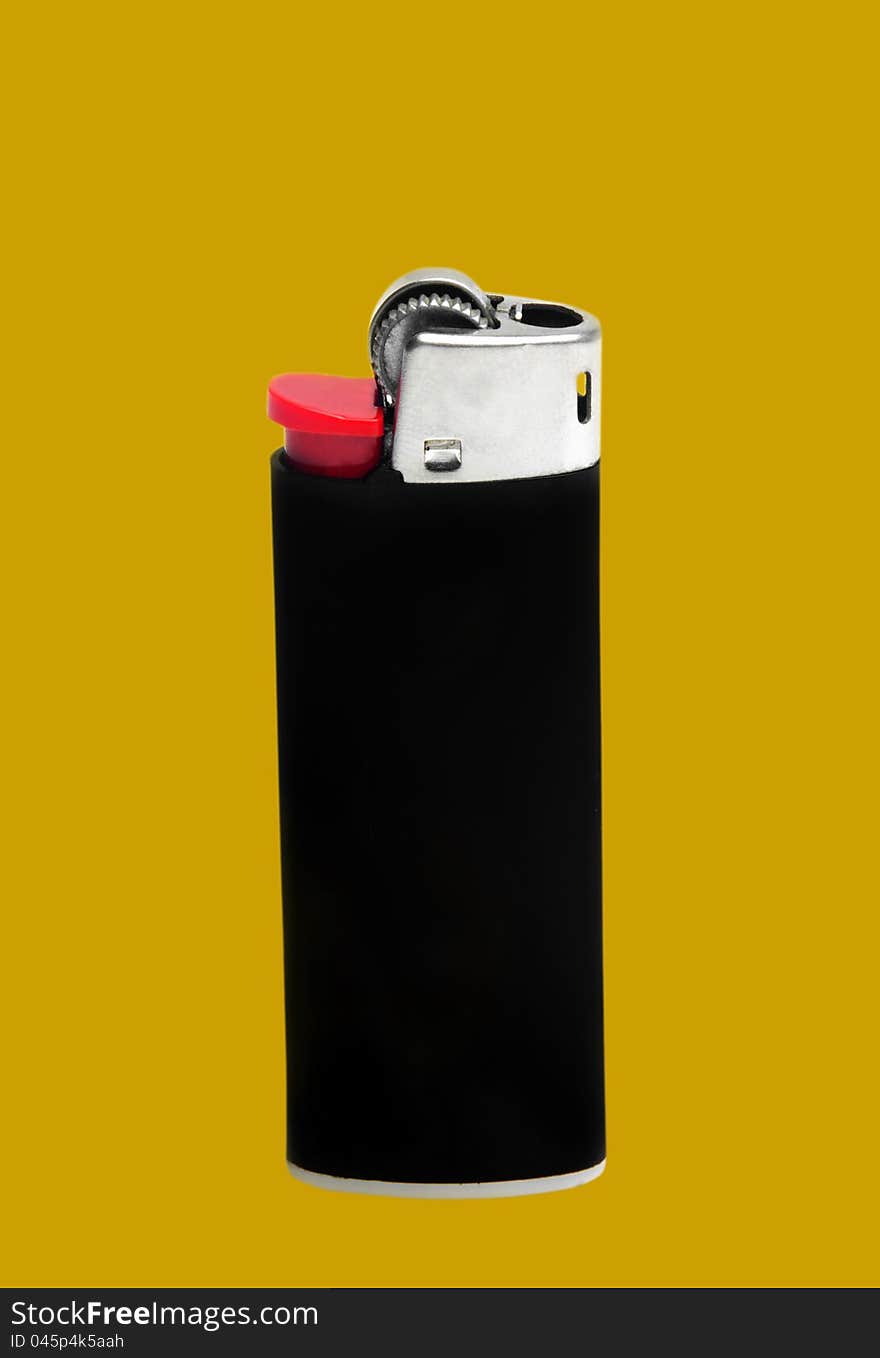 Black classic lighter on yellow. Black classic lighter on yellow