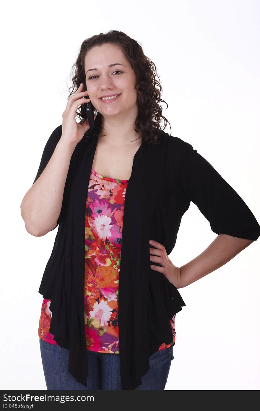 Young Brunette In Black Sweater Smiling On Phone