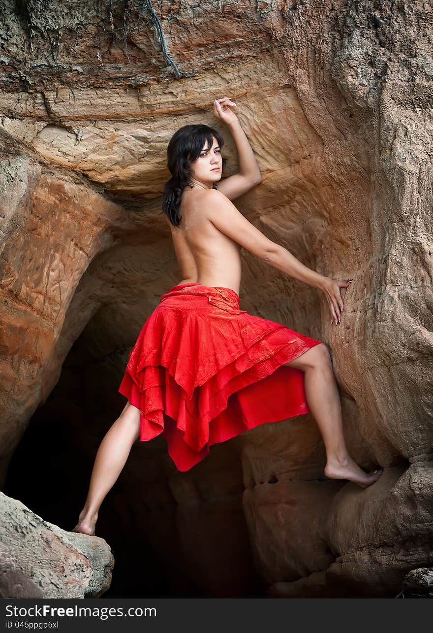 Girl in red and sandstone