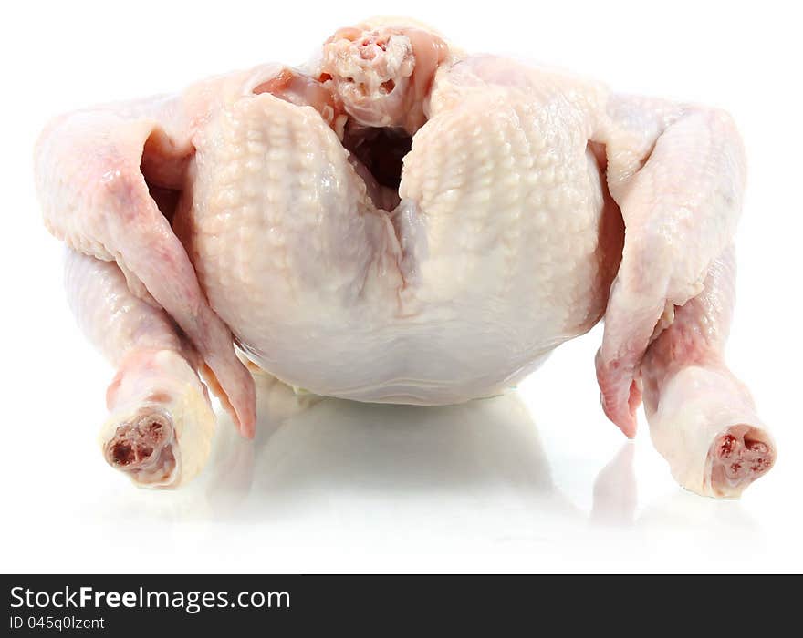 Raw chicken on white background