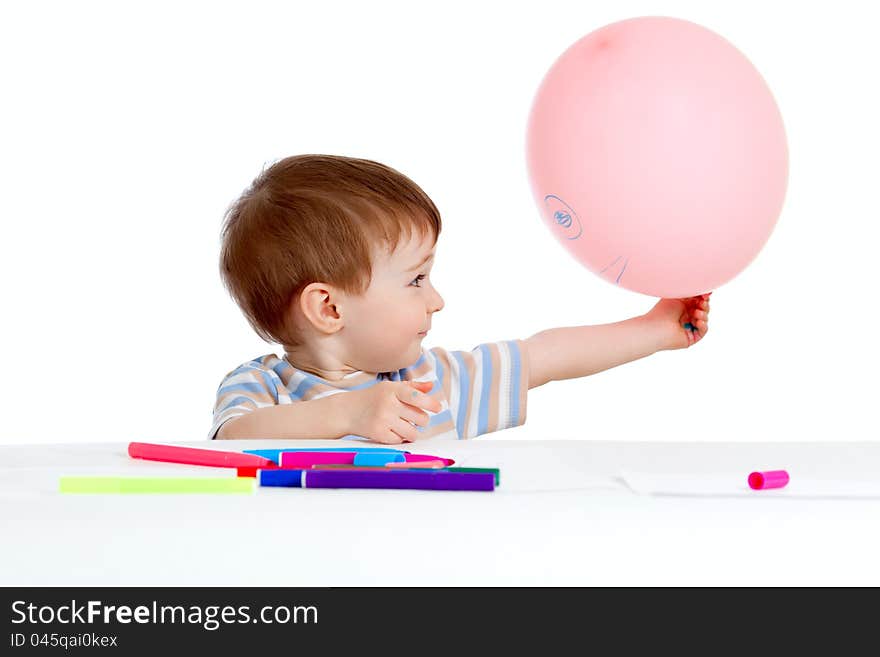 Little child with color felt pen over white. Little child with color felt pen over white