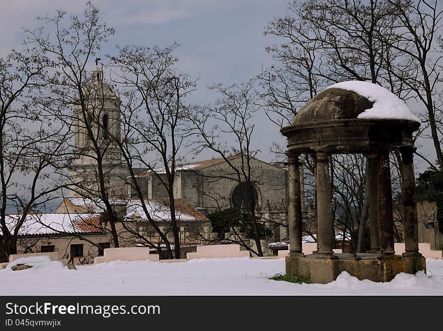 Old Roman chapel in Girona in the snow. Old Roman chapel in Girona in the snow.