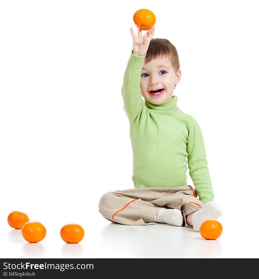 Smiling child with fruits over white background. Smiling child with fruits over white background