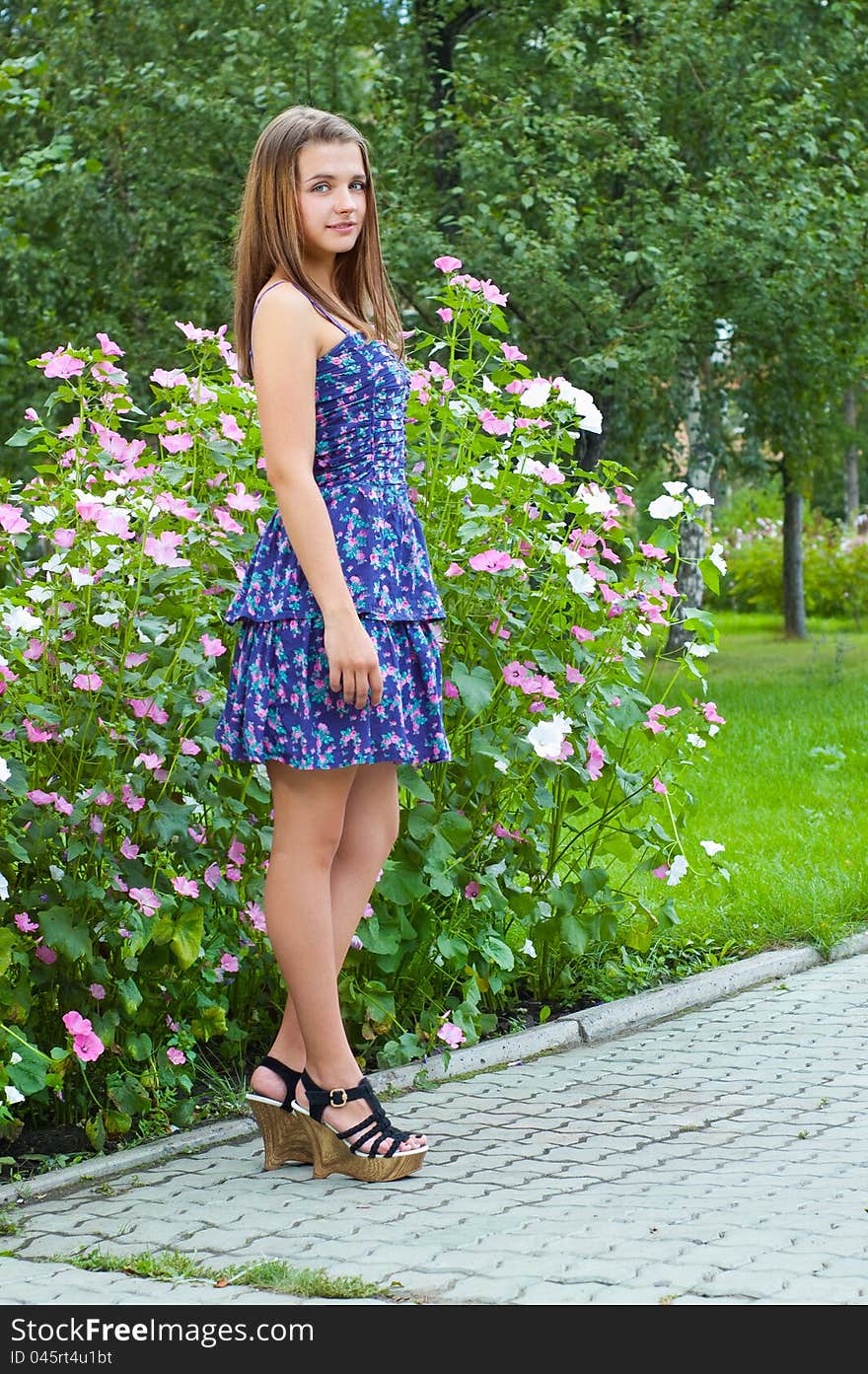 Girl with flowers in the park