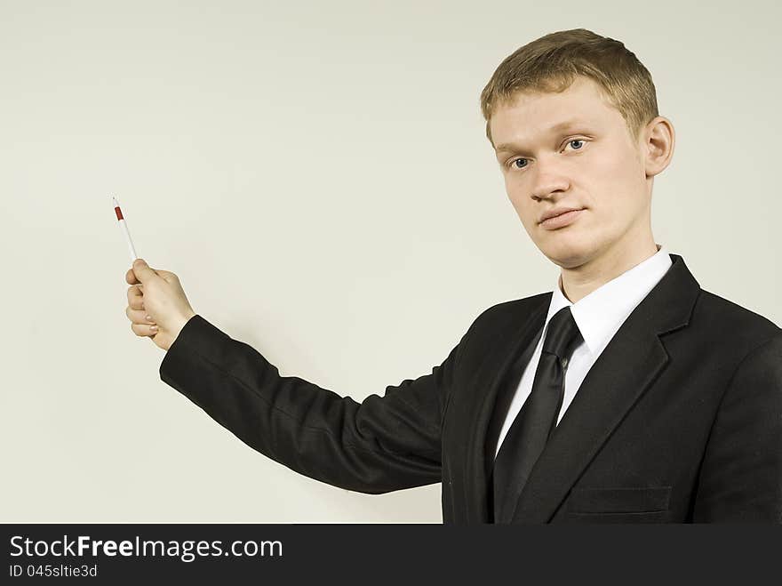 A young man shows in the background. A young man shows in the background