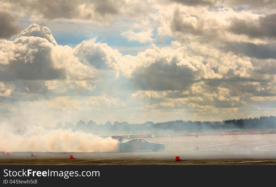 Smoke clouds drift speed the machine sunset. Smoke clouds drift speed the machine sunset