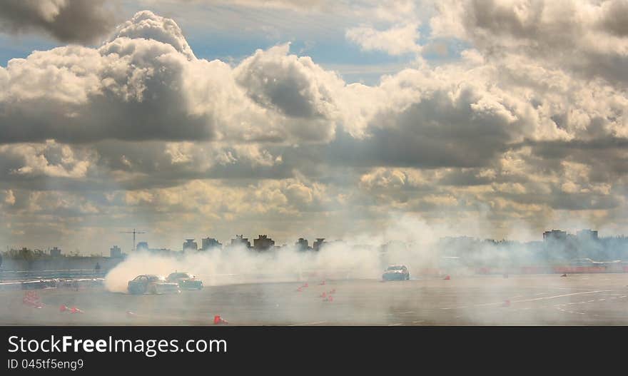 Smoke clouds drift speed the machine sunset. Smoke clouds drift speed the machine sunset