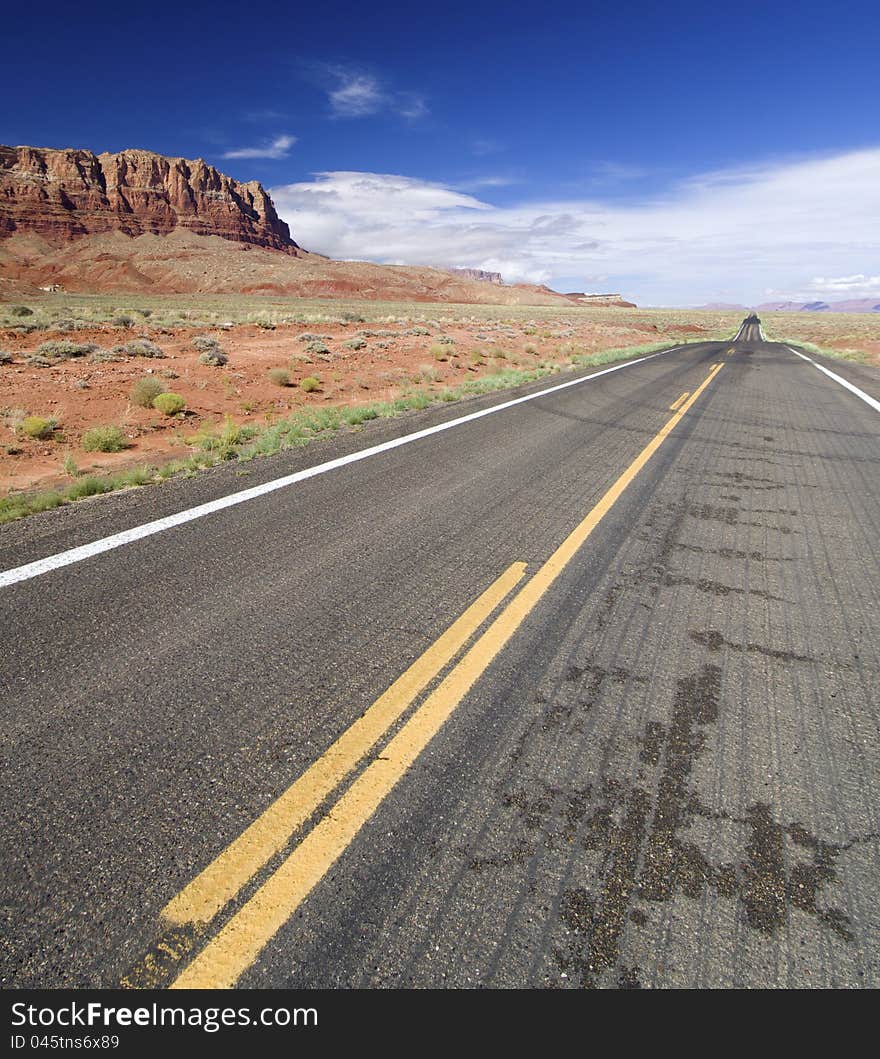 Highway with blue and cloudy sky. Highway with blue and cloudy sky