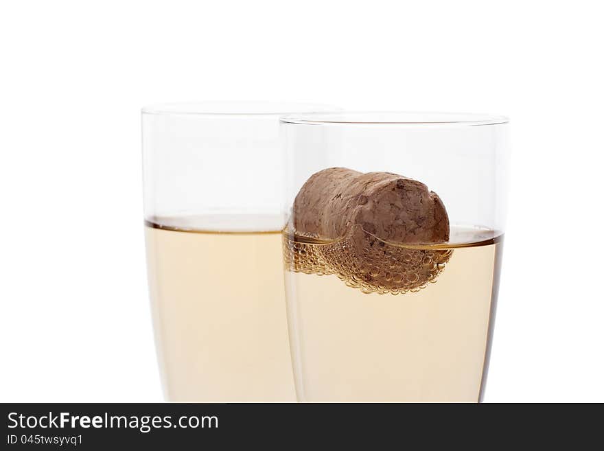 Glasses of champagne with cork