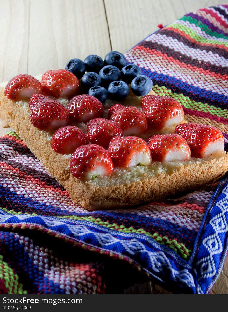 Fresh strawberries and blueberry cake, like a flag. Fresh strawberries and blueberry cake, like a flag.