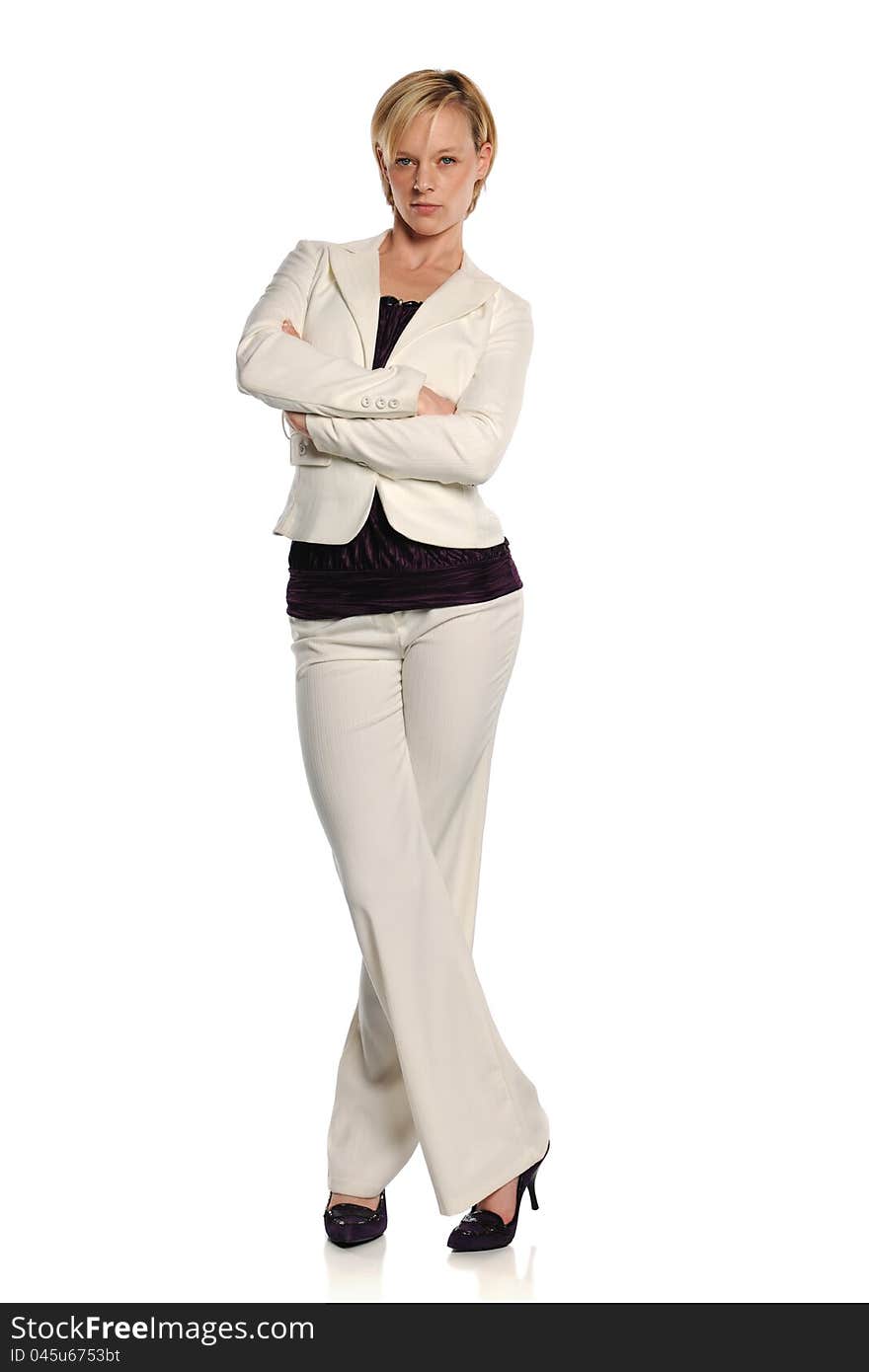 Young Businesswoman standing and with her arms crossed isolated on a white background