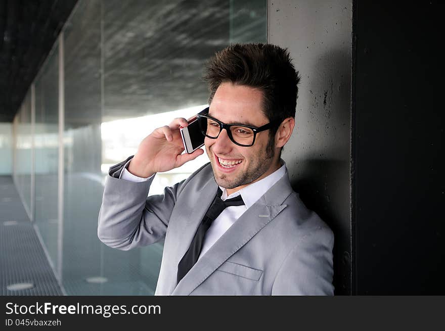 Handsome Man In Urban Background Talking On Phone