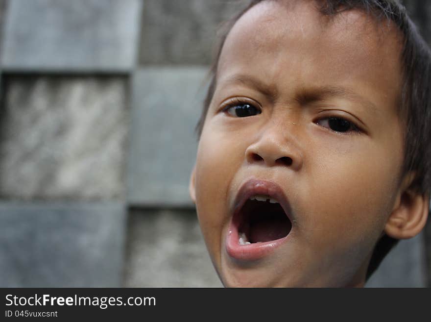 Cute Little Boy Yawning