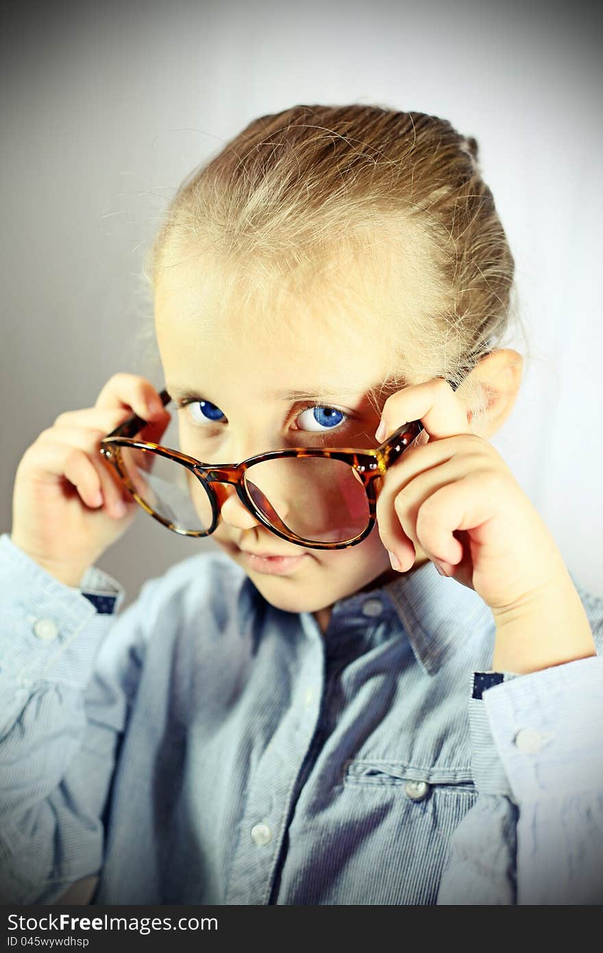 Schoolgirl With Big Glasses Blue Eye