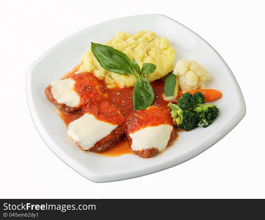 Veal with tomato and cheese on white square dish isolated on a white background