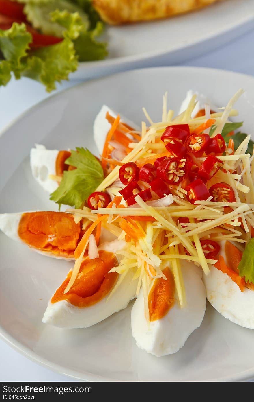 Boiled salted eggs with spicy toppings