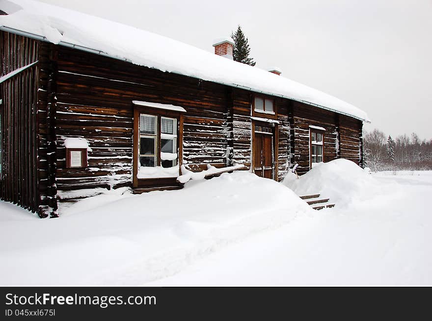 Typical Swedish cottage in the countryside, Sweden during a snowy winter. Typical Swedish cottage in the countryside, Sweden during a snowy winter