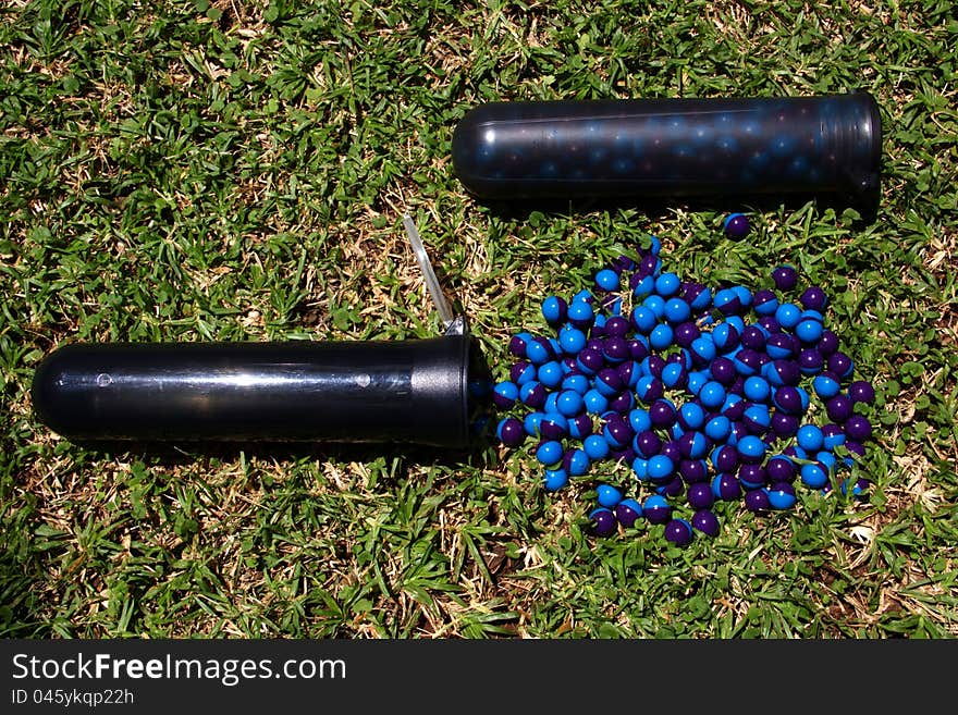 Pods with paintballs on the grass