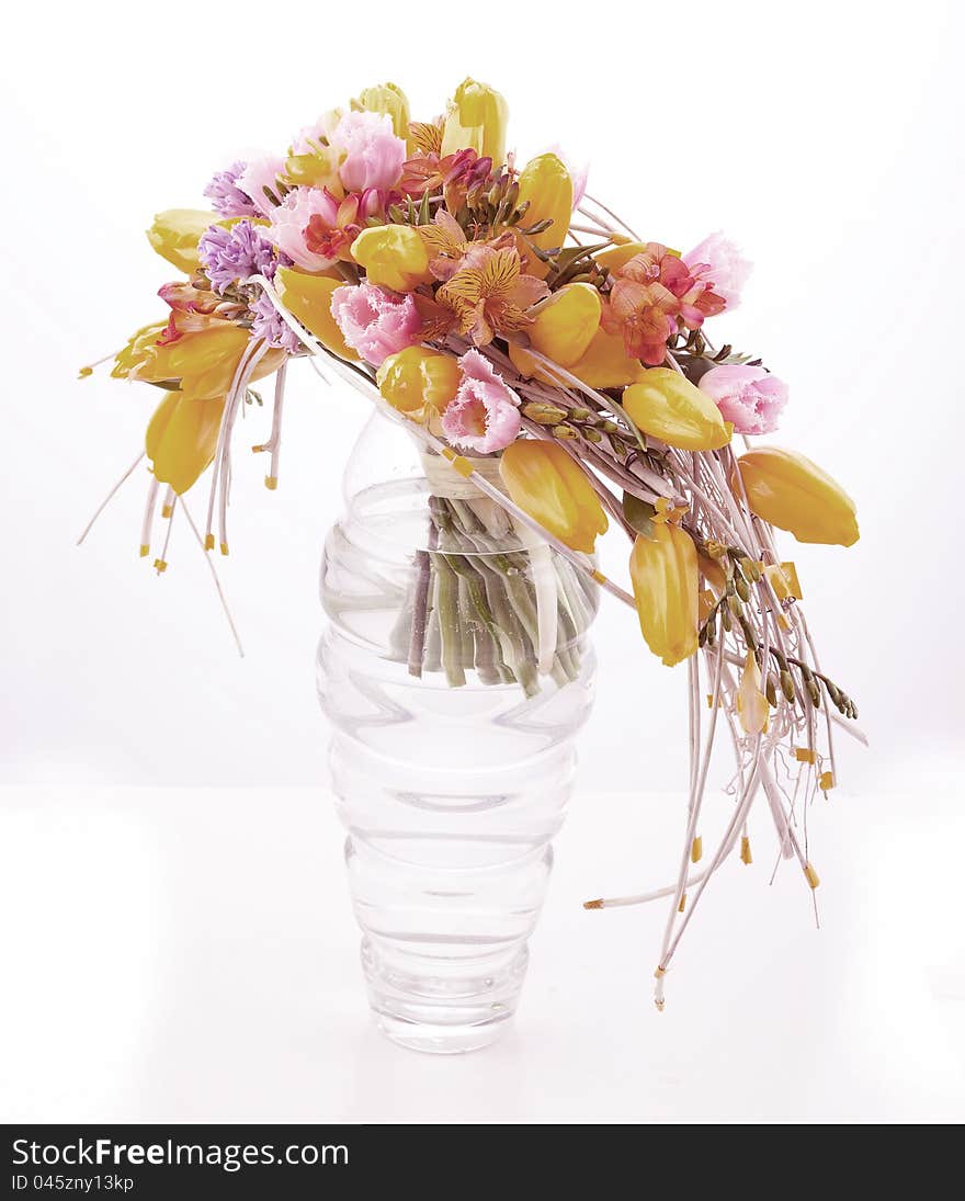 Colorful flower arrangement in glass vase