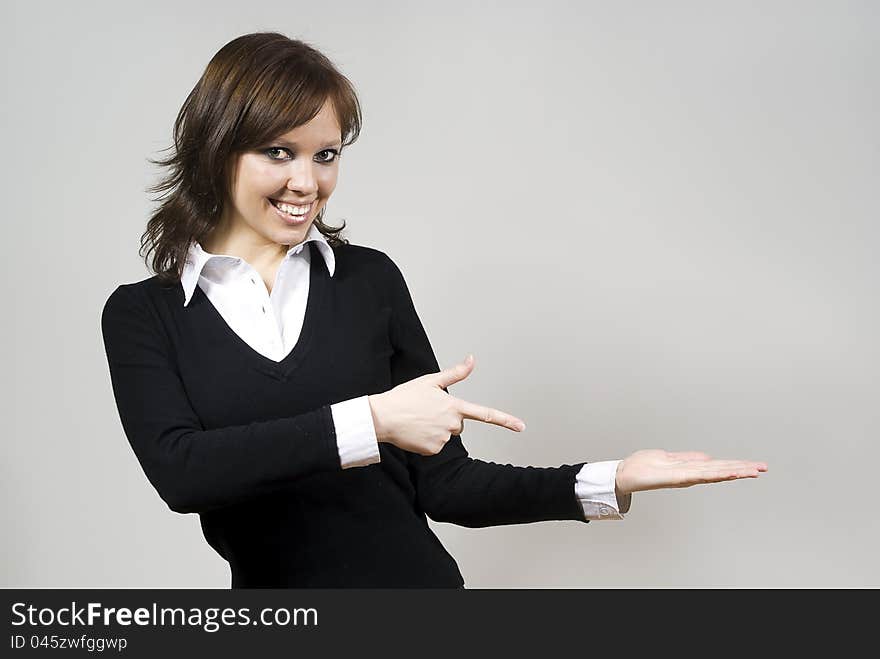 Girl Indicates  Finger On The Palm Of The Hand