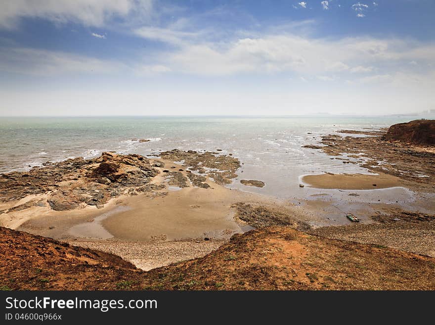 With the tide ebbing, rocks appeared on the beach of Baishawan, Jinzhou, northeast China. With the tide ebbing, rocks appeared on the beach of Baishawan, Jinzhou, northeast China.