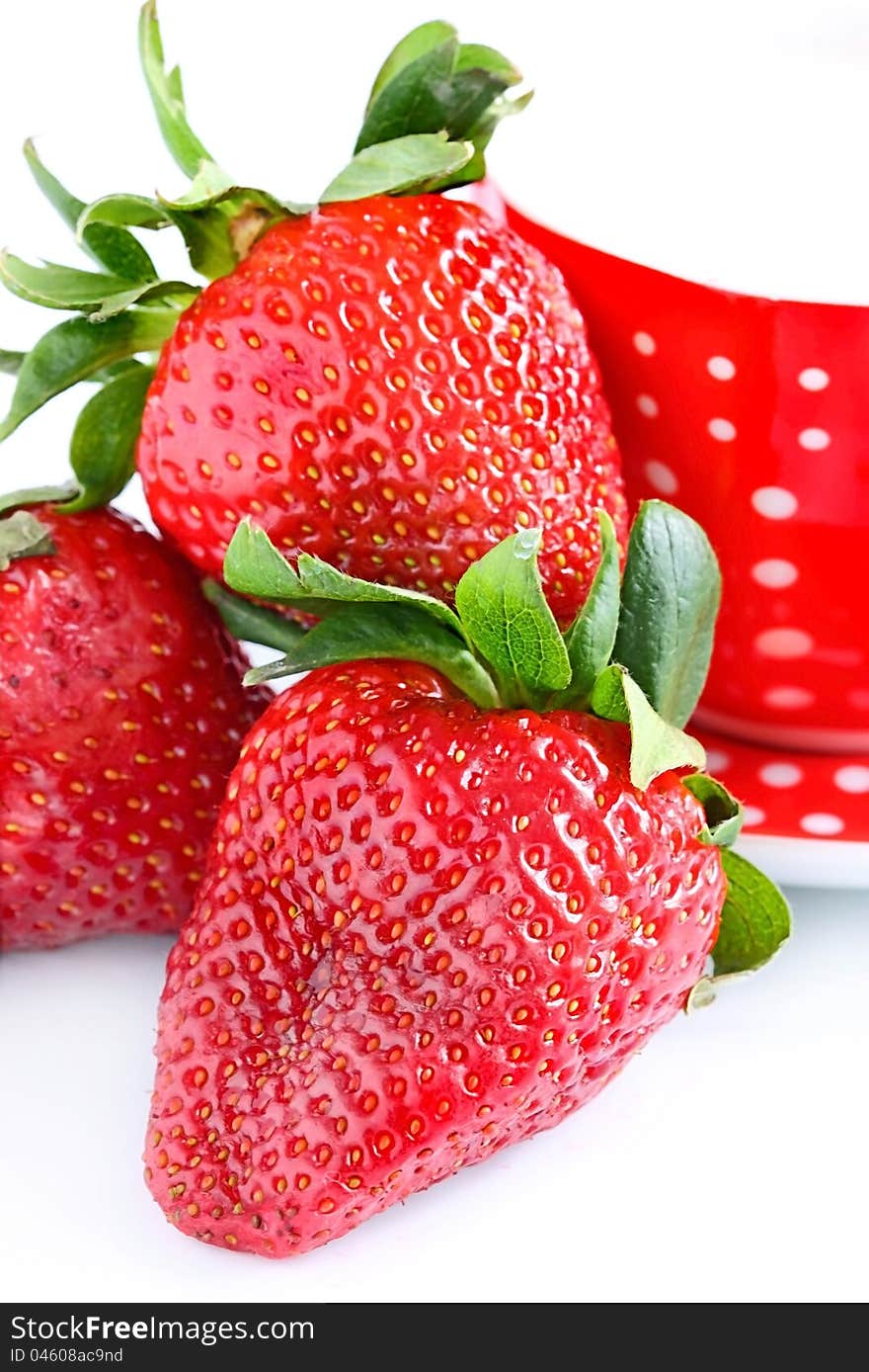 Fresh red strawberries isolated on white background