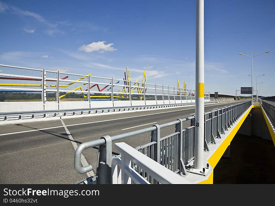 Sound absorption walls and bridge on a highway. Sound absorption walls and bridge on a highway