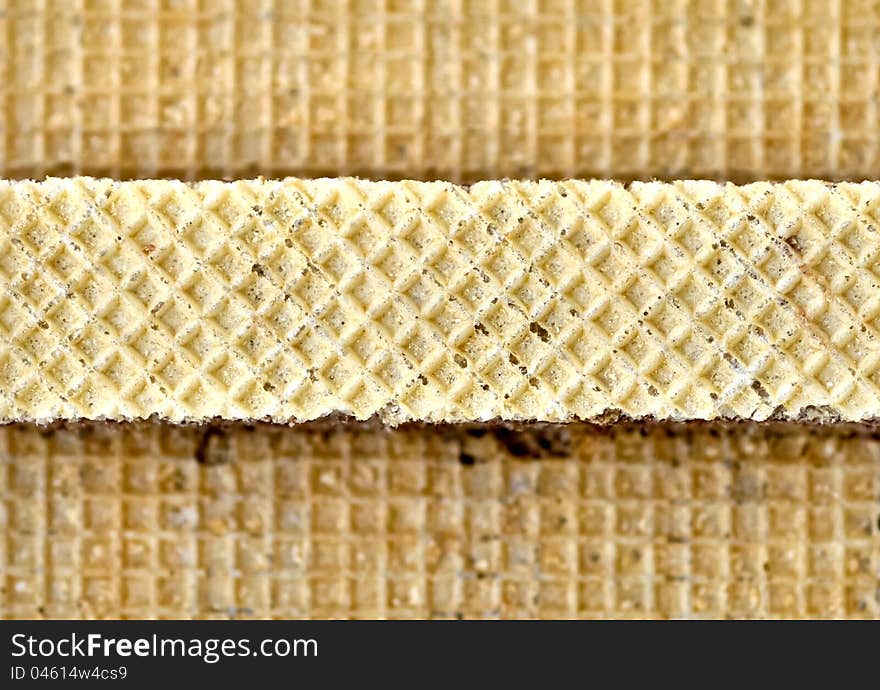 Wafer chocolate bar on top of wafer background. Wafer chocolate bar on top of wafer background