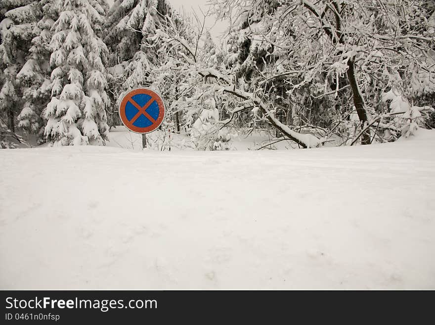 Winter landscape in the Czech Republic, snowy trees, traffic signs in the snow, winter day without the sun, the Czech countryside in winter in the mountains. Winter landscape in the Czech Republic, snowy trees, traffic signs in the snow, winter day without the sun, the Czech countryside in winter in the mountains